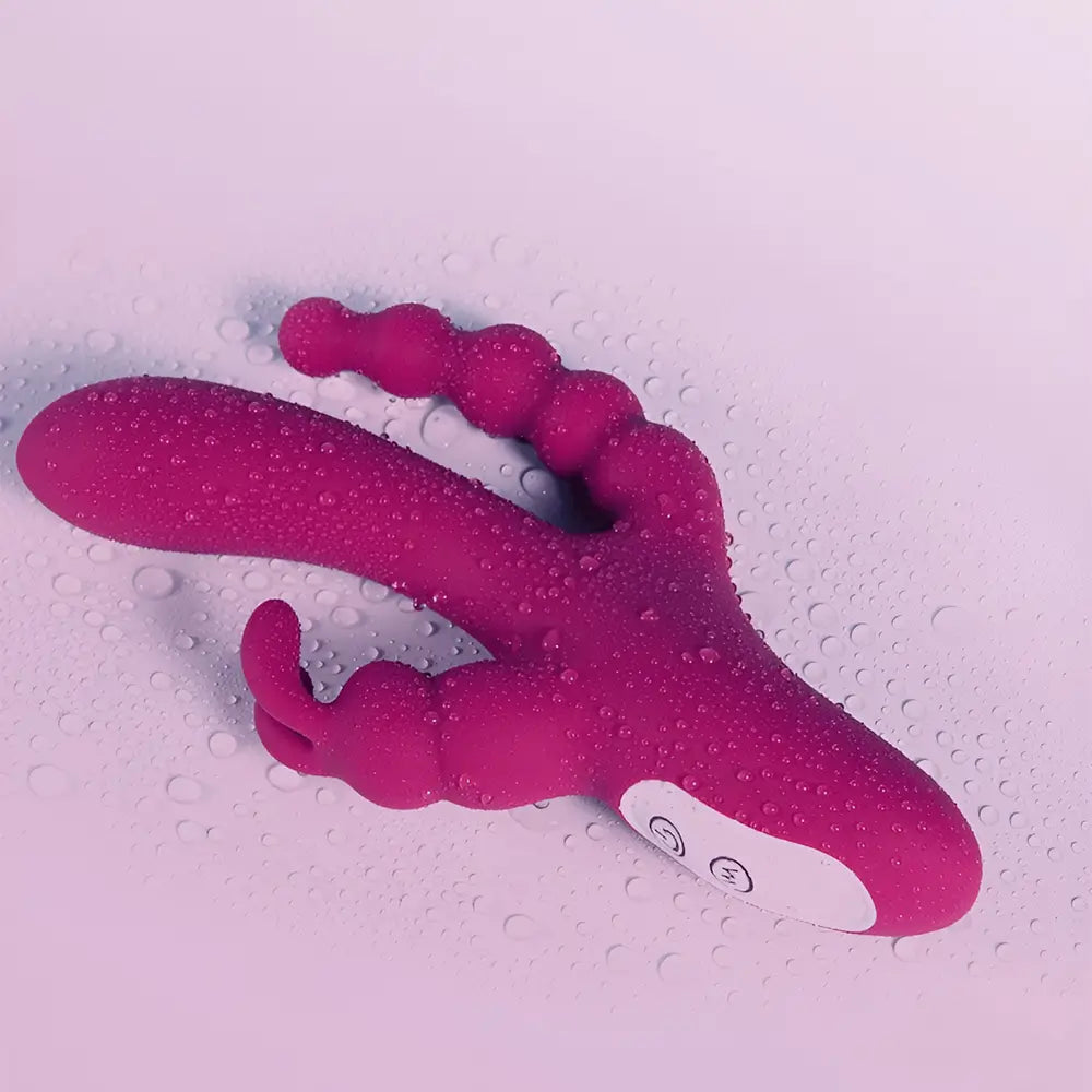 A wet Joker laid against a purple surface