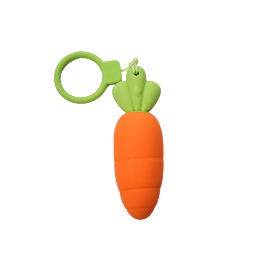 Carrot-shaped bullet vibrator with a green top on a white background