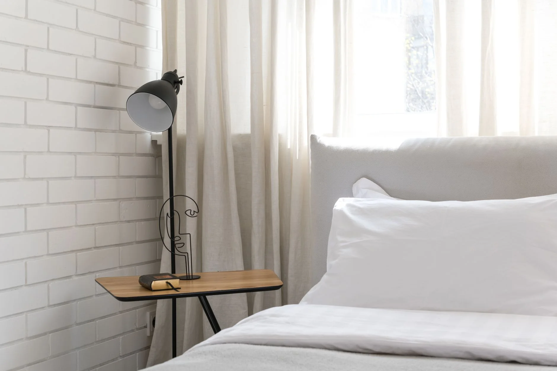 Calm minimalist bedroom with soft light — guide to penis pumps, safe use and what to expect