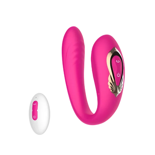 Pink and gold couple's U-shaped vibrator and a white remote control on a white background