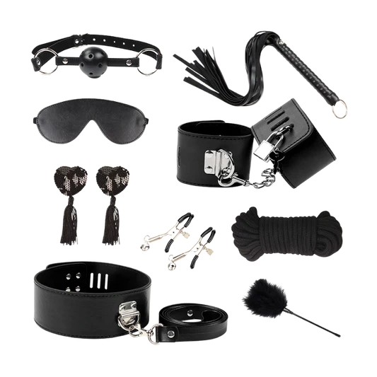 Collection of black leather bondage accessories on a white background