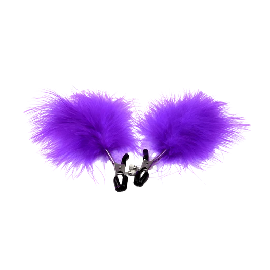 Purple fluffy feather attached to nipple clips on a white background