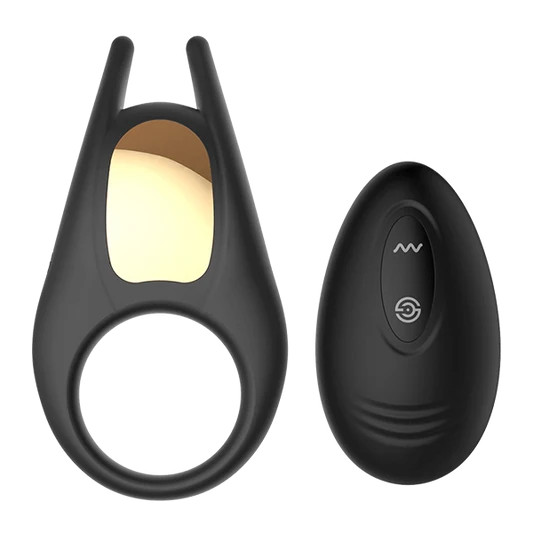 Black cock ring with a clit stimulator and a black remote control on a transparent background