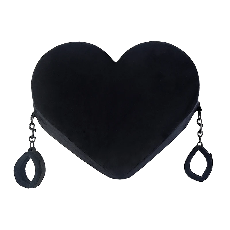 Black heart-shaped pillow with cuffs on both sides