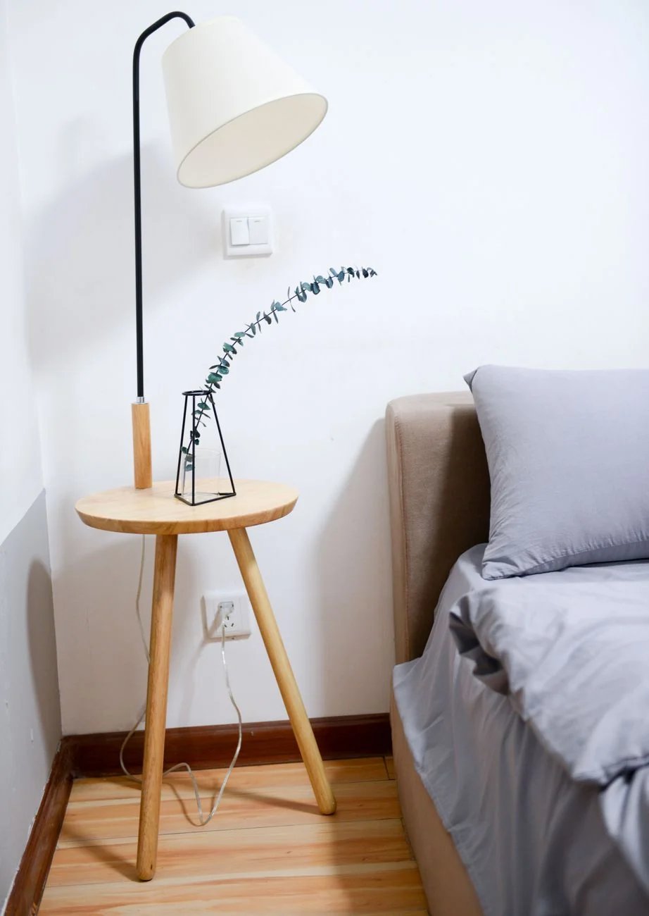 Minimalist bedroom nightstand with drawer — a cool, dry, private storage spot