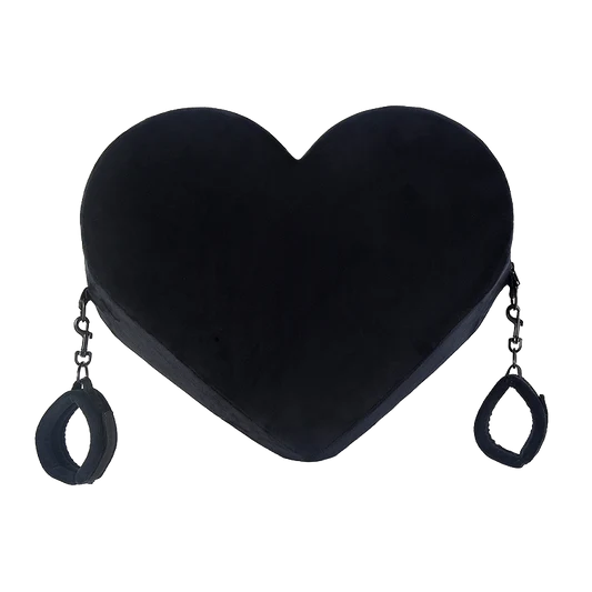 Black heart-shaped pillow with cuffs on both sides