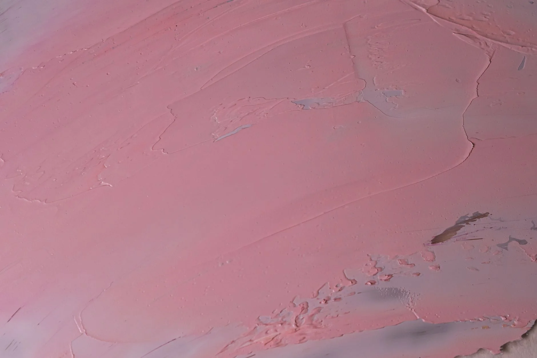 Soft pink texture close-up illustrating smooth non-porous body-safe materials