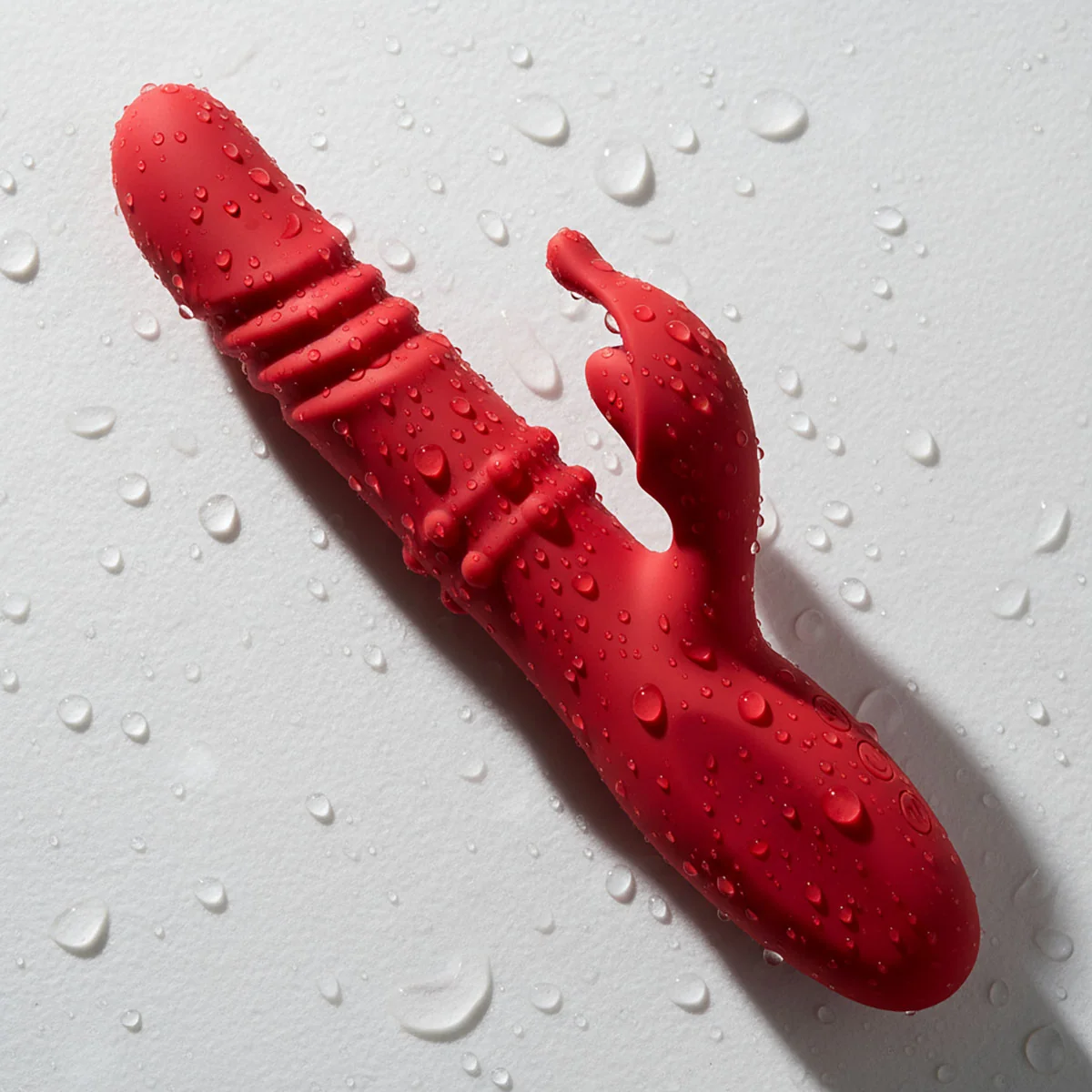 Dual Vibe on red silk