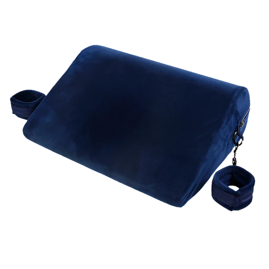 Velvet blue triangle sex pillow with rounded corners and attached cuffs on both sides
