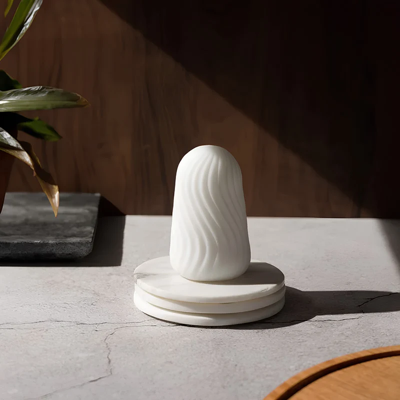 Super propped against a marble plate across a slice of sunlight