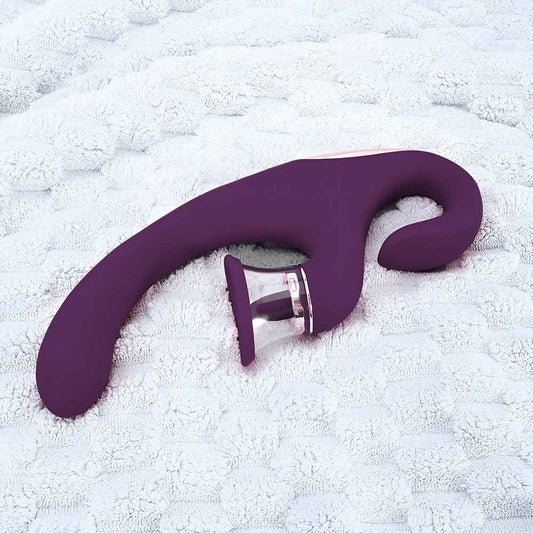 Sandra laying on a grey rug
